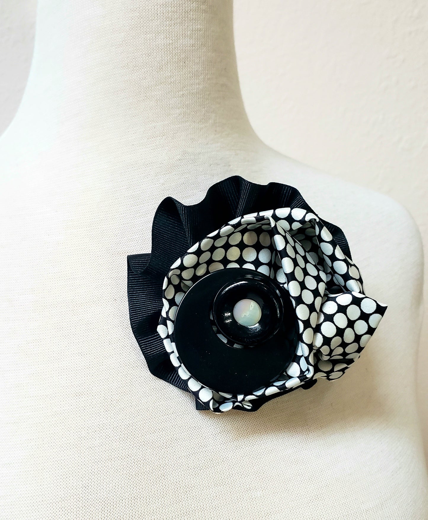 Black and white checked brooch