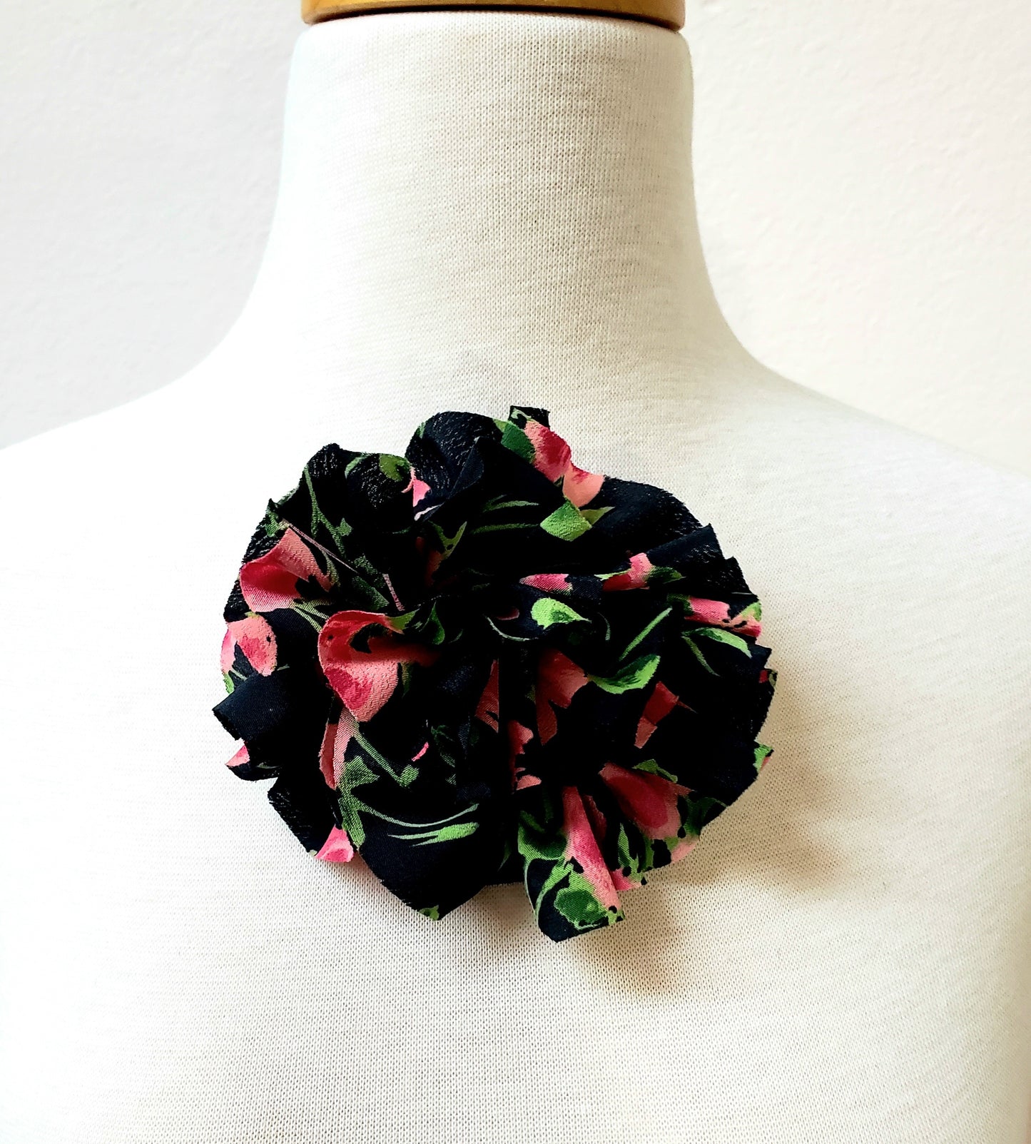 Pink and black floral print brooch