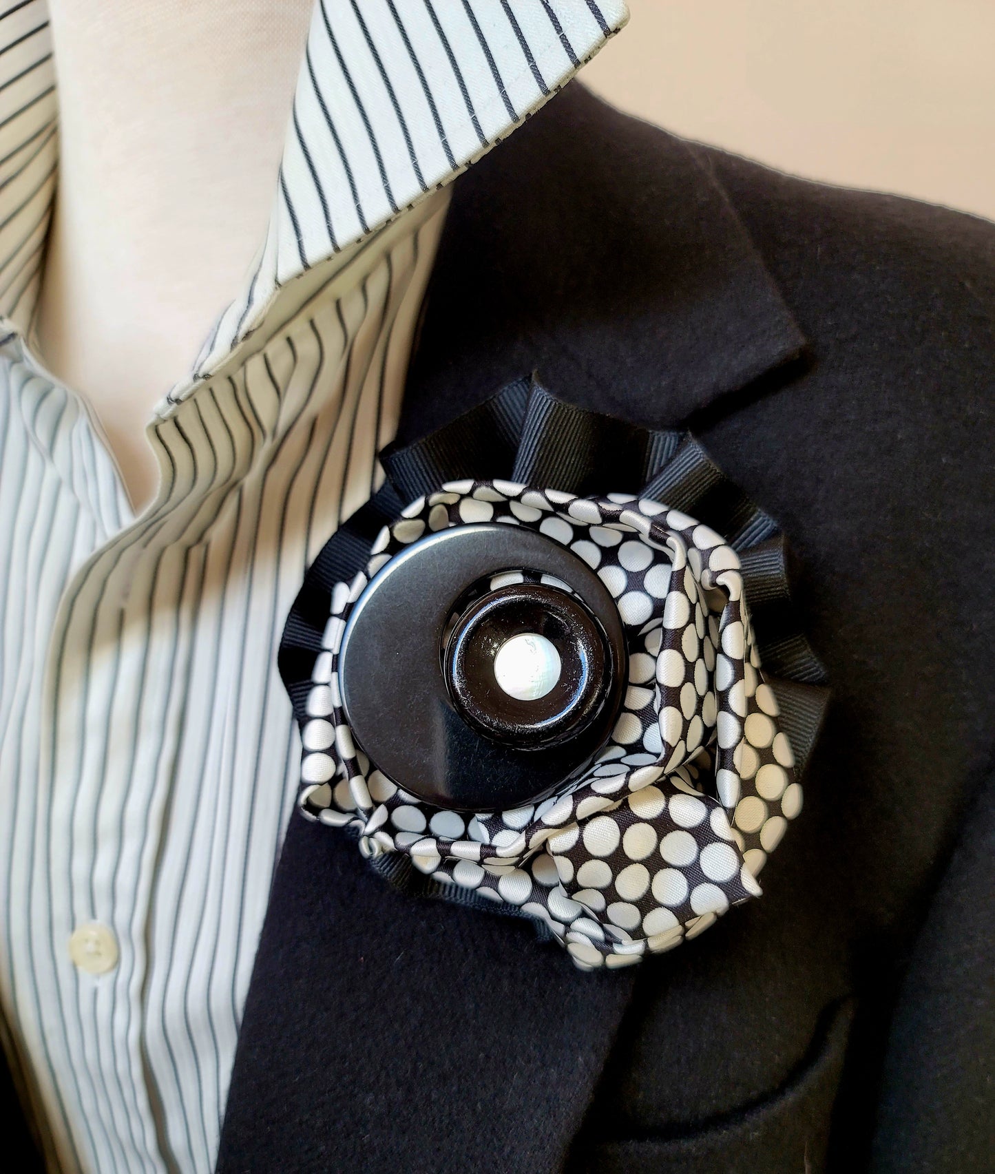Black and white checked brooch