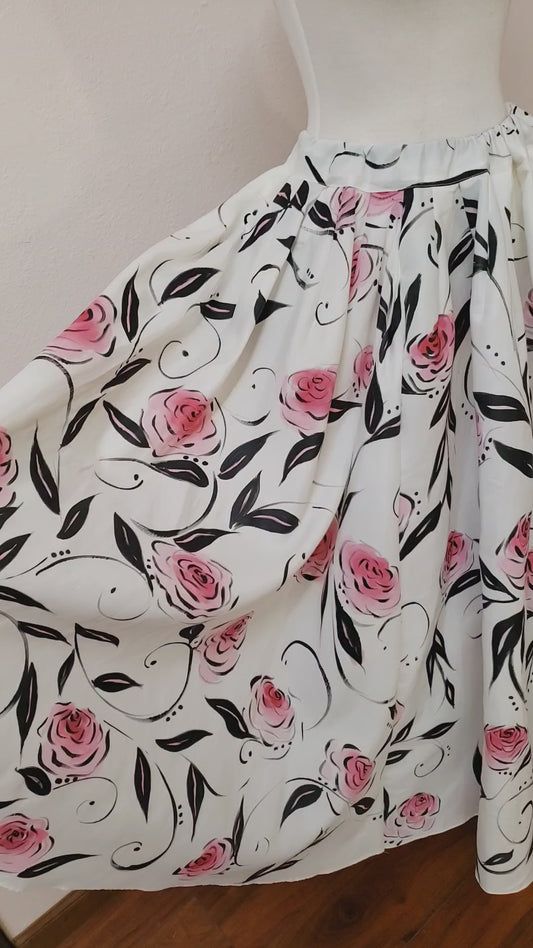 Handpainted full skirt . Deep pink rose on a white background with black leaves and accents